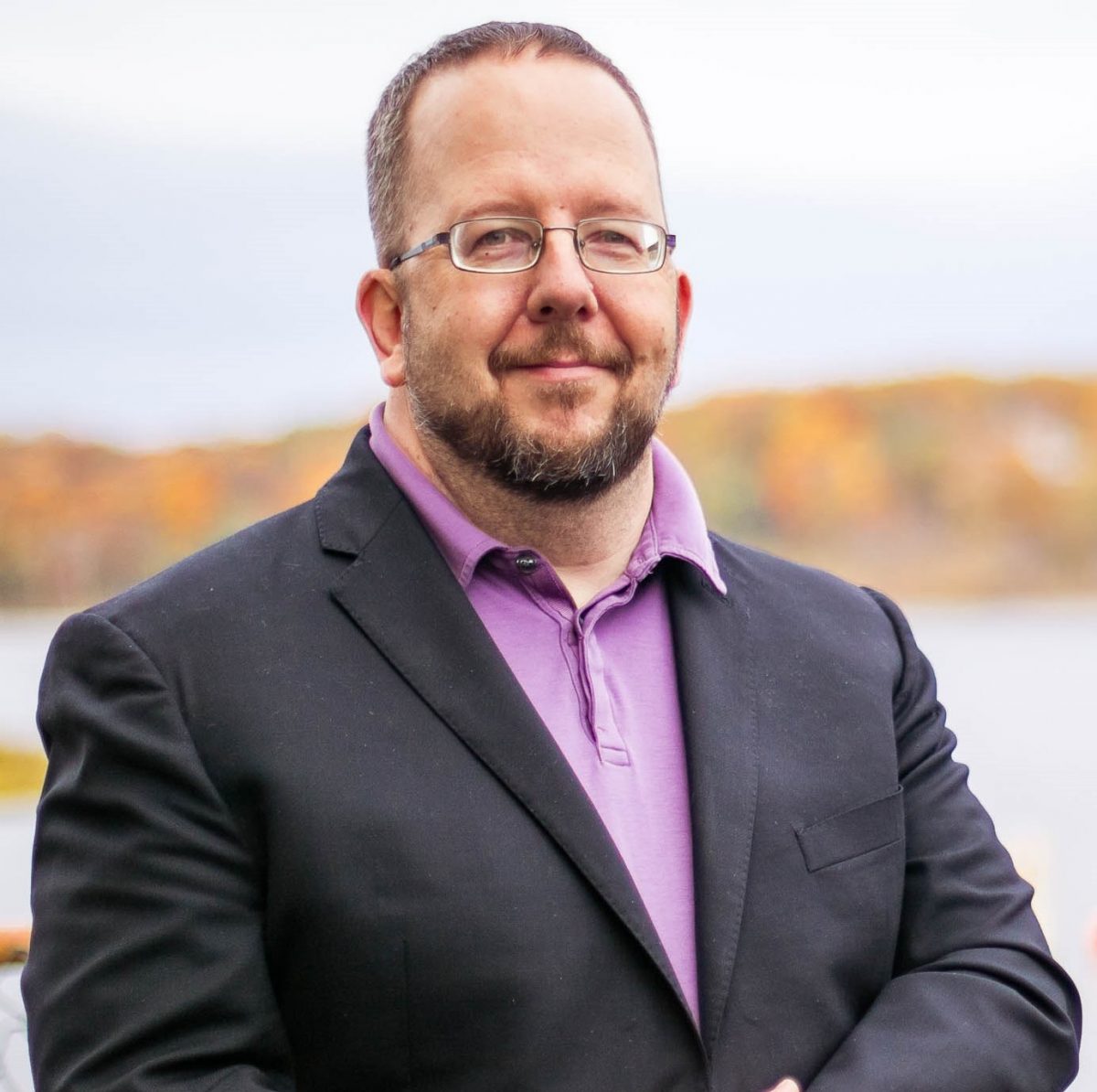 Dan 2020 Headshot Purple Black Water Fence